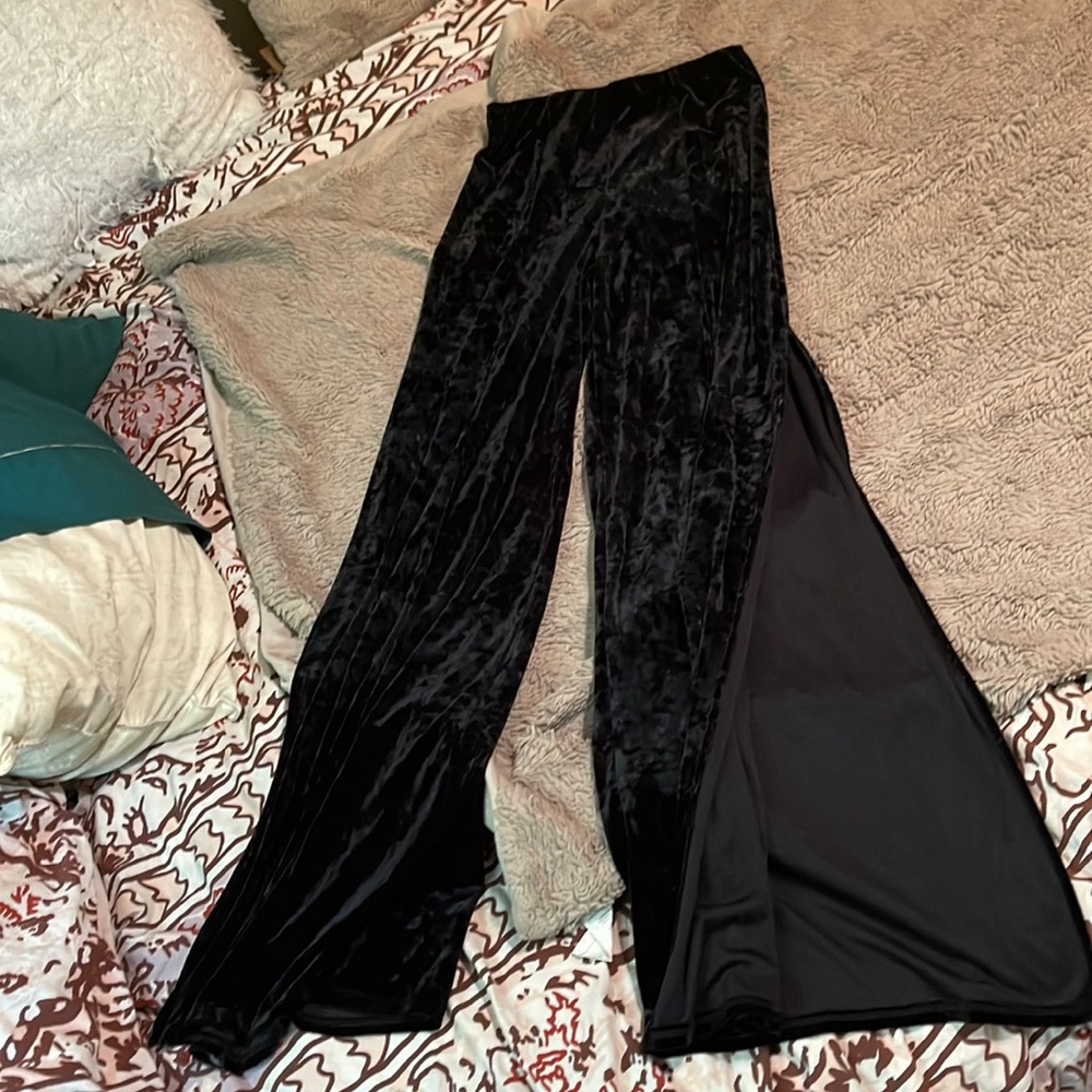 Black velvet flair pants with a side slit on the legs. only worn once.